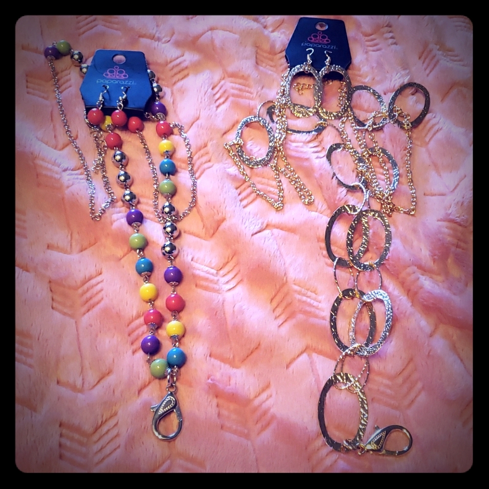 Paparazzi dressy lanyards with matching earrings.
